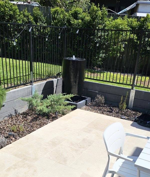 Custom water feature integrated into a Brisbane landscape design