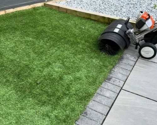Professionally prepared turf area with neat landscape edging