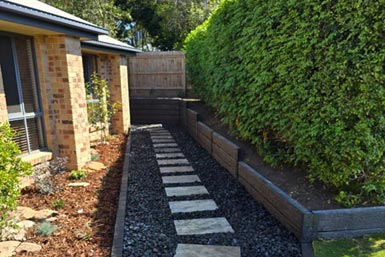 Paved driveway and entrance — completed landscaping project